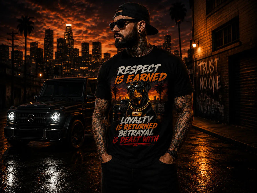 Respect Is Earned statement graphic tee worn by model on a city street at night – INKDnART best sellers