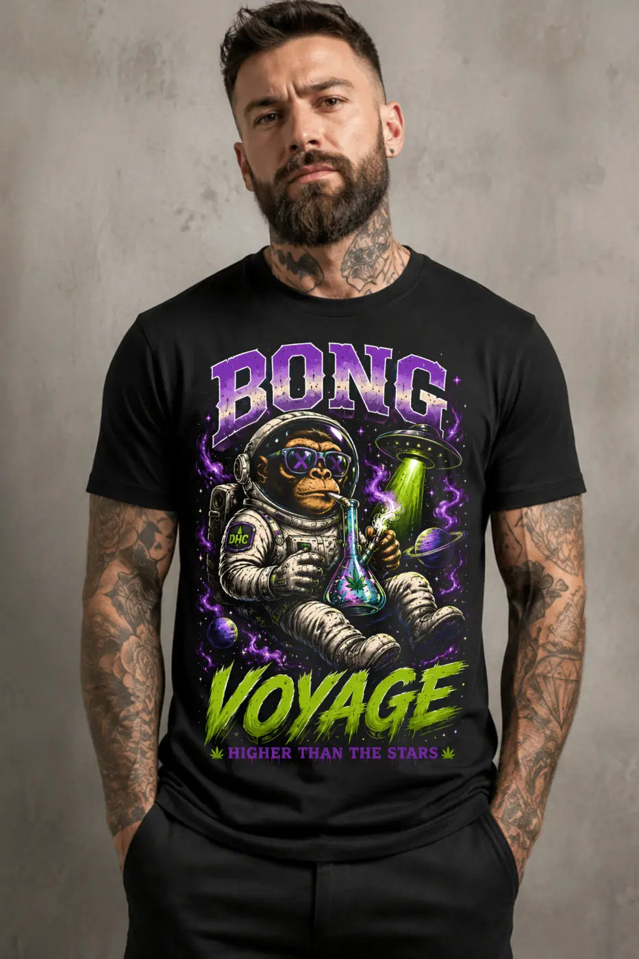 Bong Voyage Tee – purple and lime cosmic ape astronaut graphic tee, worn by tattooed model on gray background