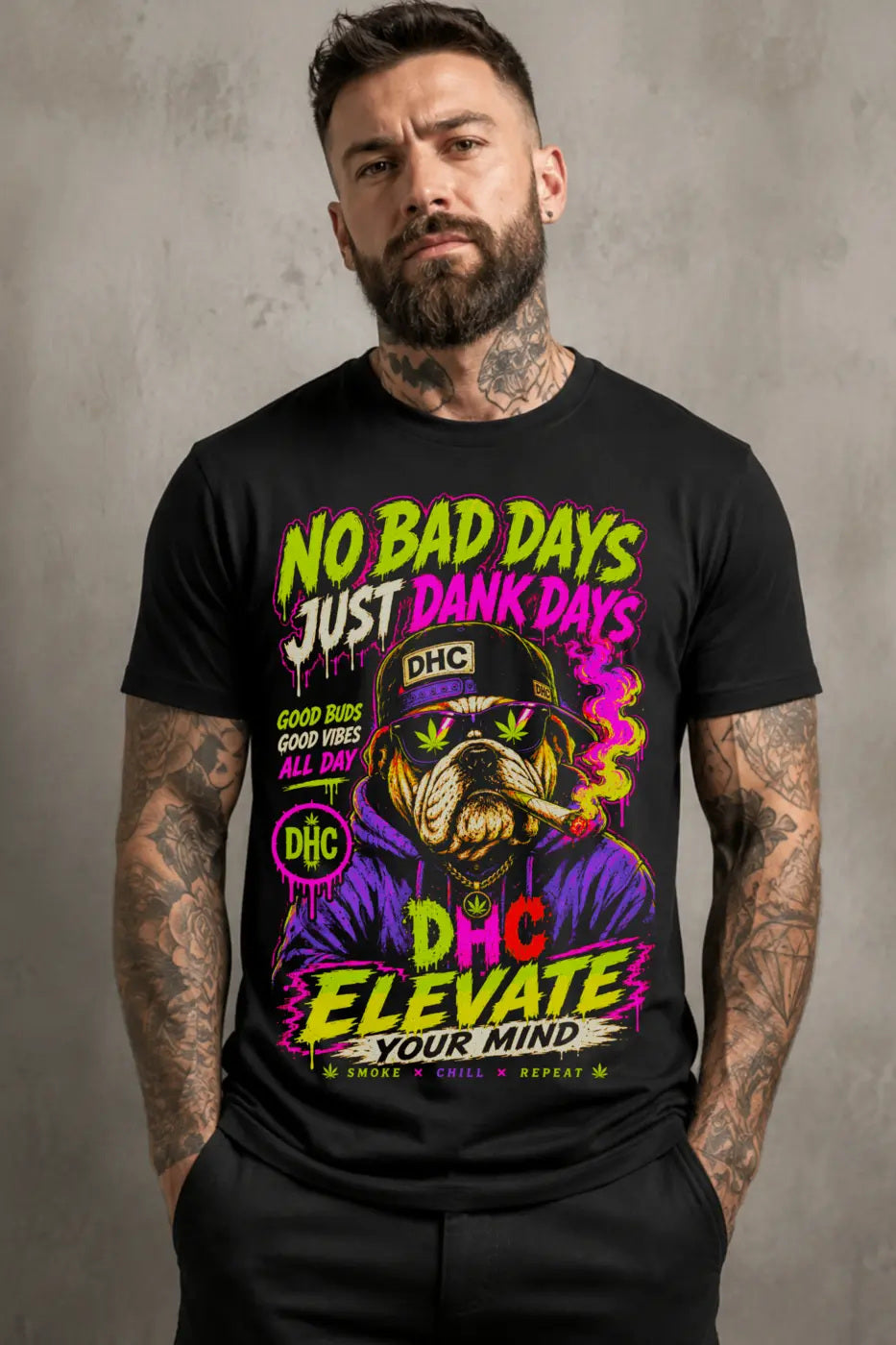 Dank Days Bulldog Tee – lime and hot pink bulldog graphic tee, worn by tattooed model on gray background