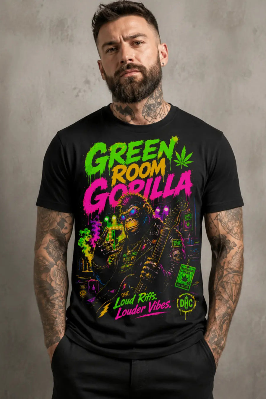 Green Room Gorilla Tee – blacklight neon gorilla graphic tee, worn by tattooed model on gray background