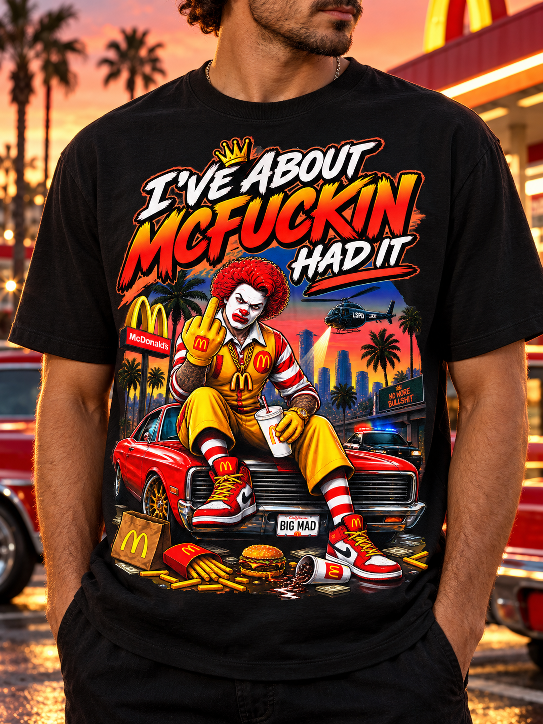 Close front view of the black McFuckin Had It T-shirt showing the complete colorful graphic and crewneck.