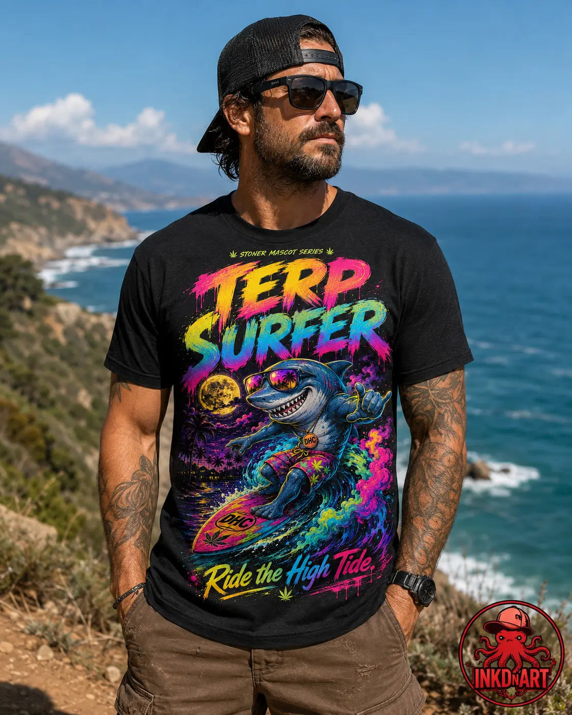 Terp Surfer Tee – psychedelic skull surfer graphic tee, worn by model on an ocean cliff