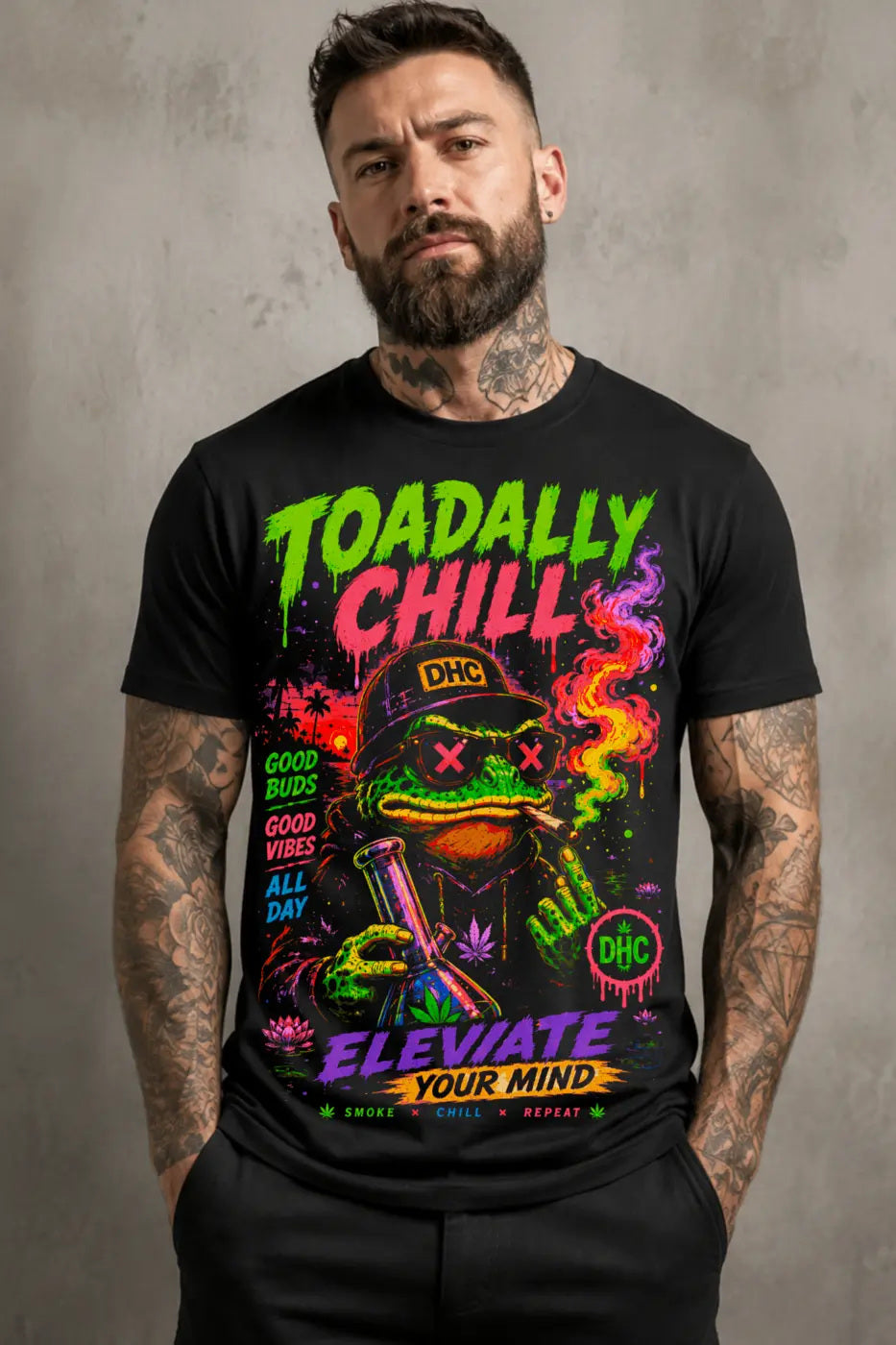 Toadally Chill Tee – neon green chill toad graphic tee, worn by tattooed model on gray background