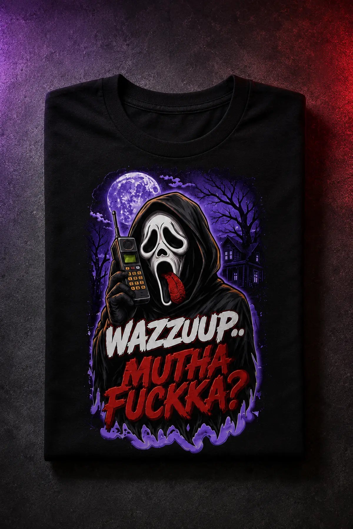 Wazzuup Ghost Tee – ghost-face horror graphic tee in purple, folded tee on dark red background