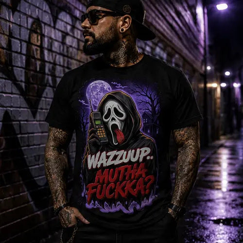 Wazzuup Ghost Tee – ghost-face horror graphic tee in purple, worn by model in a purple-lit graffiti alley