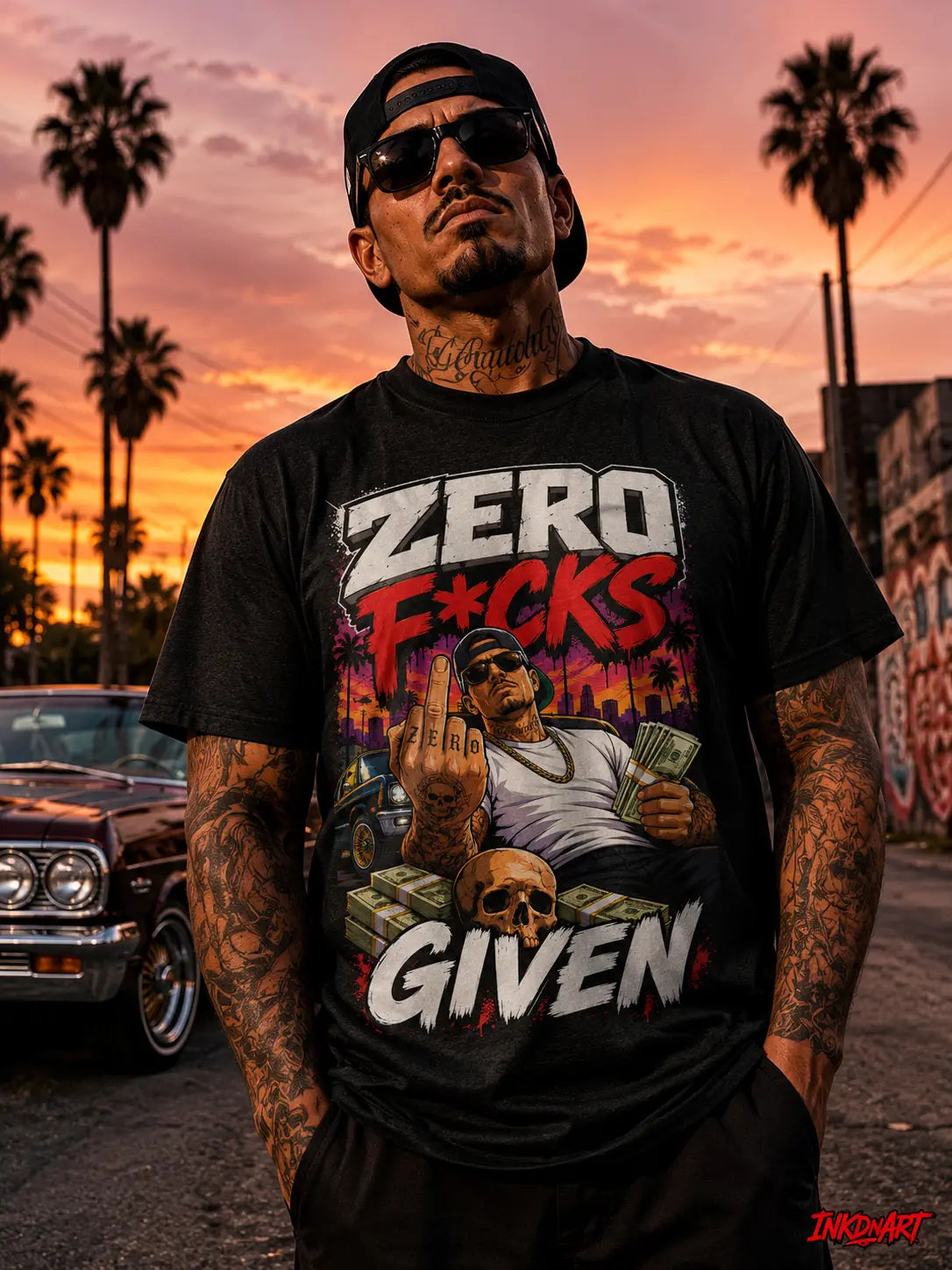 Zero Apologies Tee – street-scene statement graphic tee, worn by model at sunset with palm trees